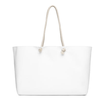 Vista trasera del bolso KONE Weekender con acabado limpio y elegante.