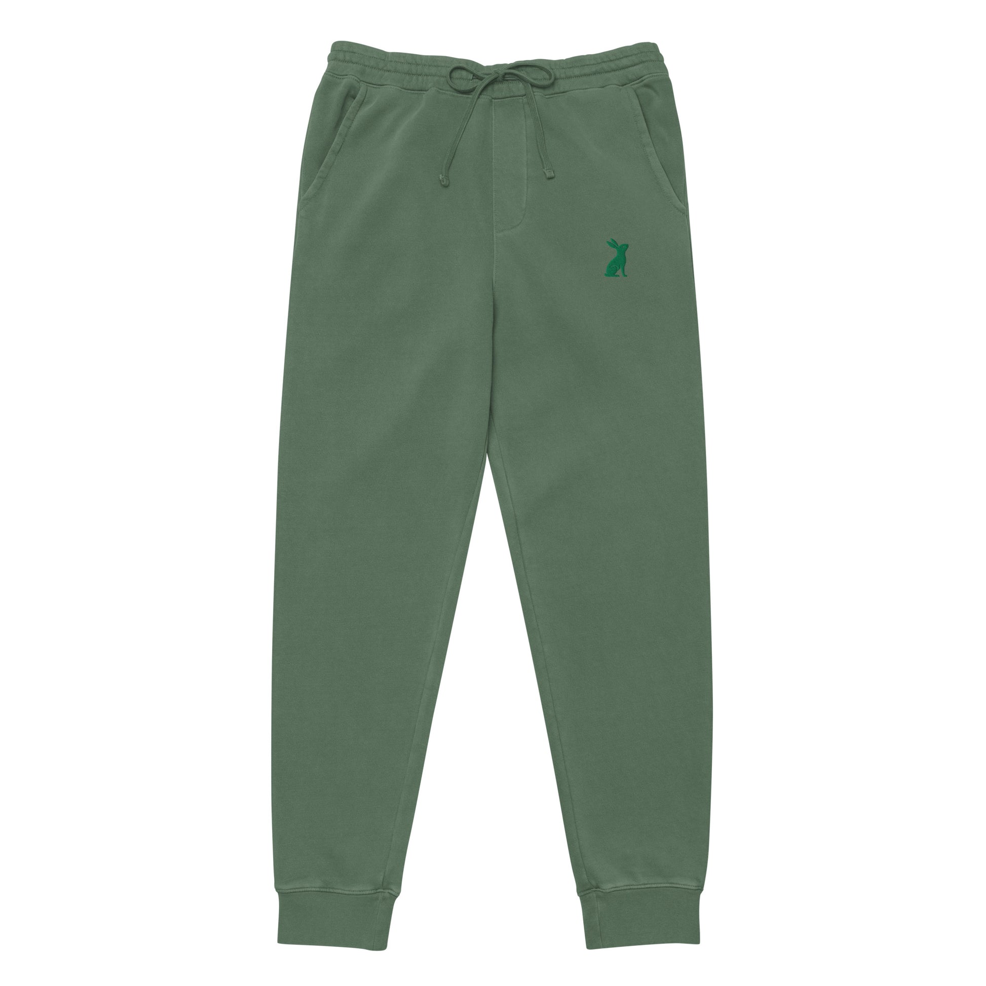 Parte trasera del pantalón KÖNE verde con bolsillo posterior y ajuste relajado.