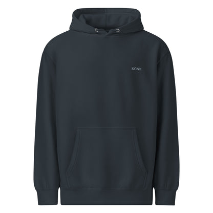 Sudadera KÖNE azul marino con capucha y acabado premium.