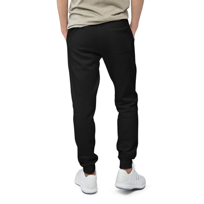 Parte trasera del pantalón KÖNE negro con bolsillo derecho y acabado de canalé.