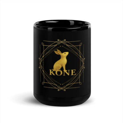 Taza KÖNE de cerámica brillante, detalle del logo dorado.
