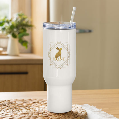 Tumbler KÖNE blanco con logo de conejo dorado, diseño premium y minimalista.