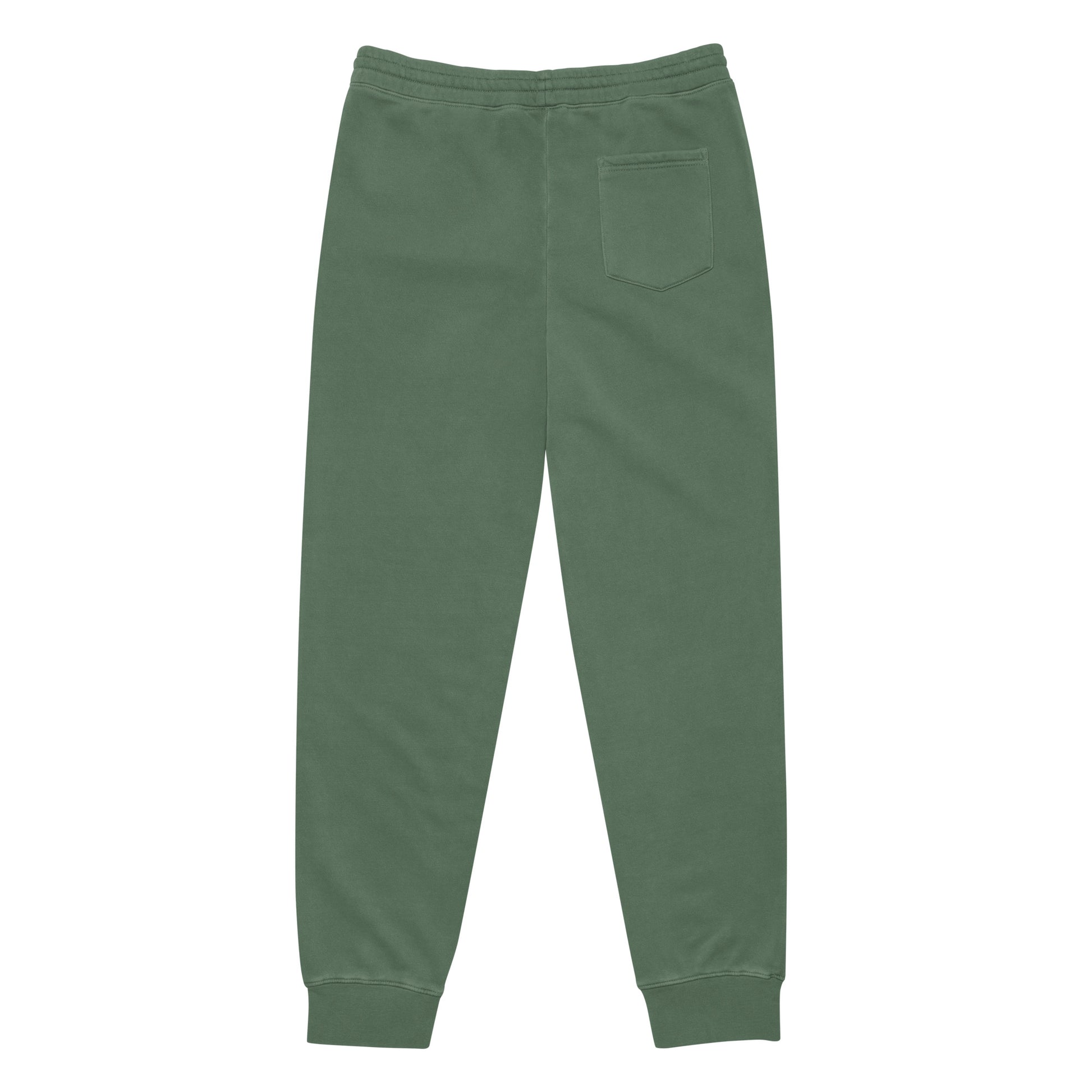 Pantalón KÖNE verde lavado de algodón con logo bordado y puños acanalados, vista frontal sobre fondo neutro